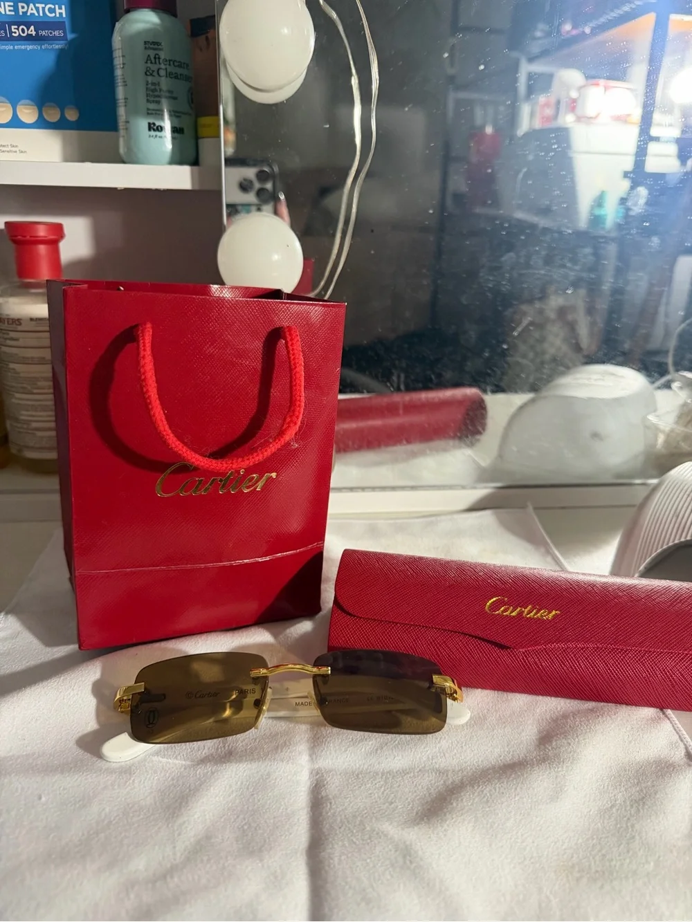 Cartier Rimless Sunglasses with Gold Frame and Brown Lenses
